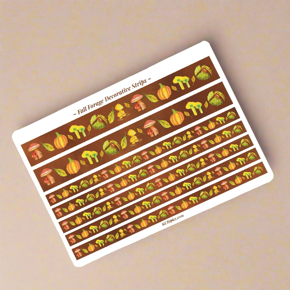 White sticker sheet with 2 wide and 5 narrow sticker strips in a warm brown with a repeating botanical pattern featuring mushrooms, conker, and pumpkins