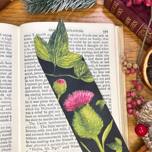 Winters bloom thistle and ivy illustrated bookmark cut at the top to the shape of the ivy leaf